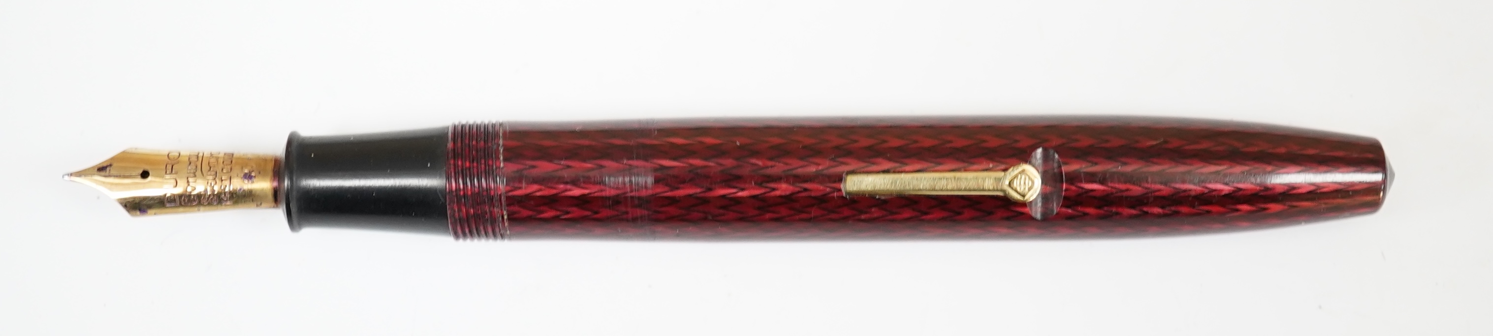 A Conway Stewart No.60L in red herringbone